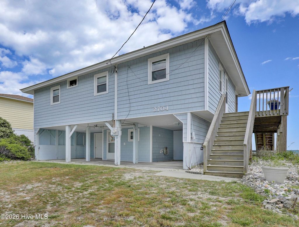 Photo of 2704 S Shore Drive, Surf City, NC 28445 (MLS # 100568809)