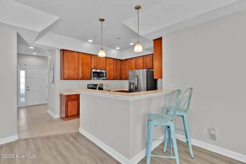 Tiny photo for 908 Resort Circle #Unit 604, Sunset Beach, NC 28468 (MLS # 100598142)