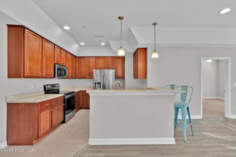 Tiny photo for 908 Resort Circle #Unit 604, Sunset Beach, NC 28468 (MLS # 100598142)