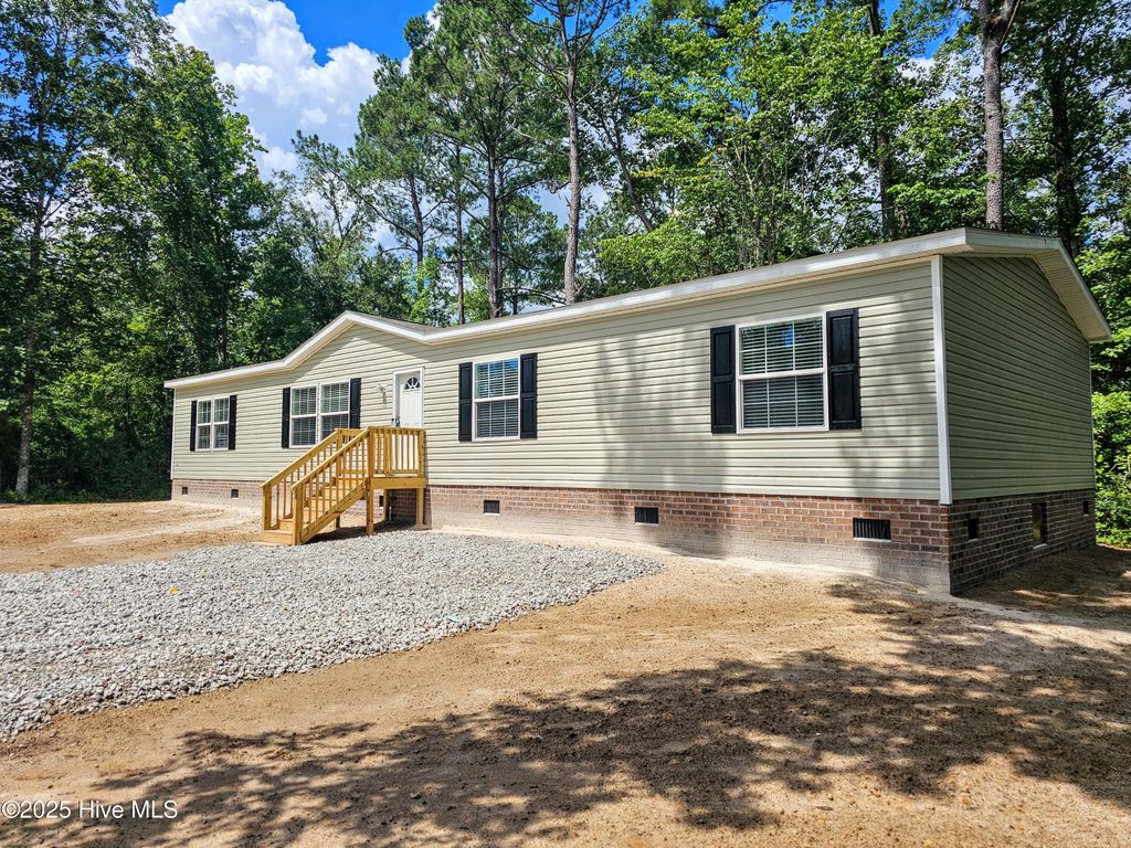 Photo of 105 Hickory Drive, Leland, NC 28451 (MLS # 100523710)