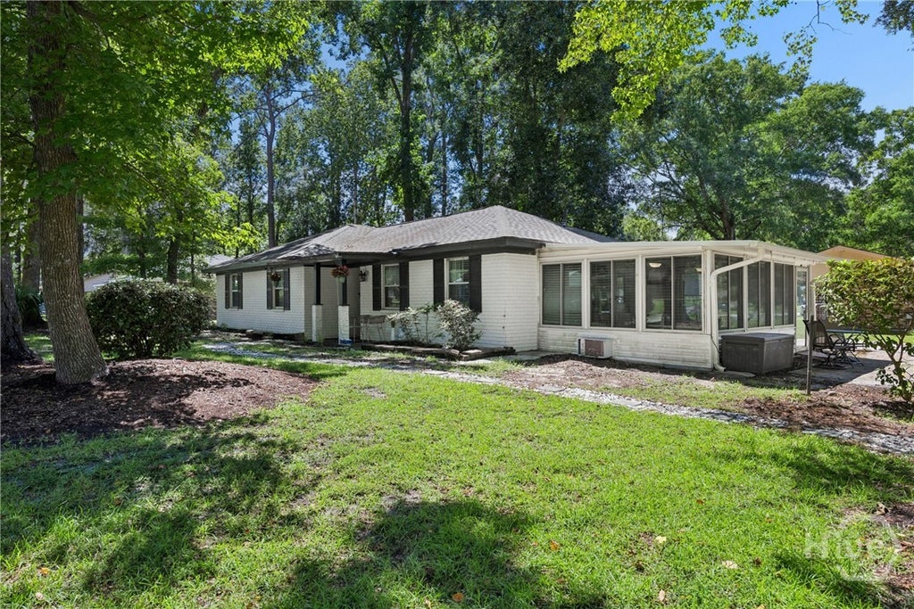Photo of 352 Sandpiper Road, Richmond Hill, GA 31324 (MLS # SA363799)