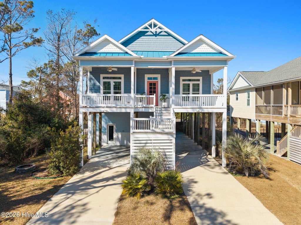 Photo of 111 SE 41st Street, Oak Island, NC 28465 (MLS # 100605058)