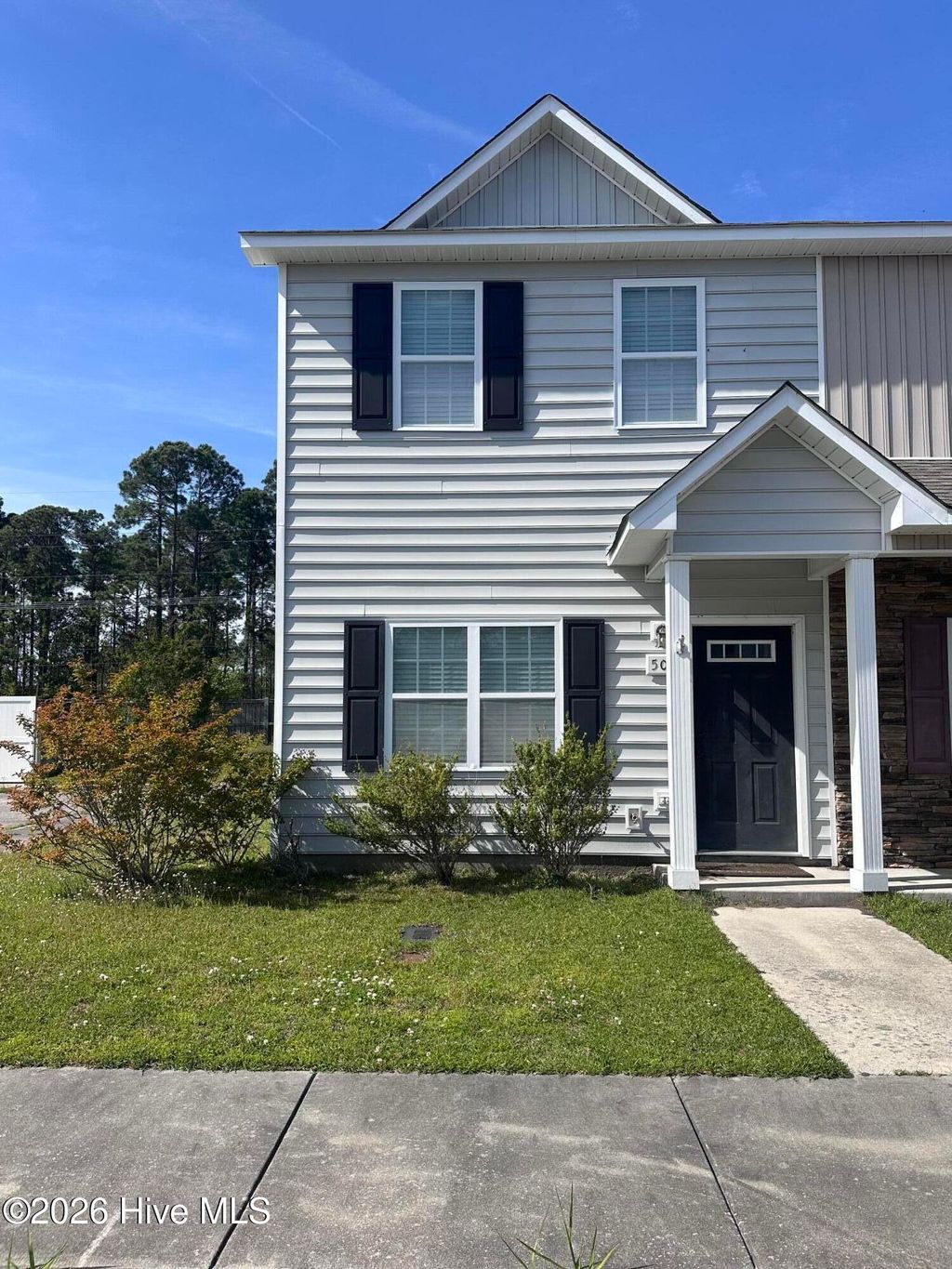 Photo of 501 Oyster Rock Lane #1, Sneads Ferry, NC 28460 (MLS # 100568387)