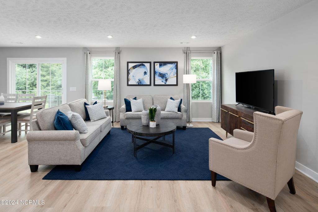 Photo of 4065 Farmfield Drive, Navassa, NC 28451 (MLS # 100523920)