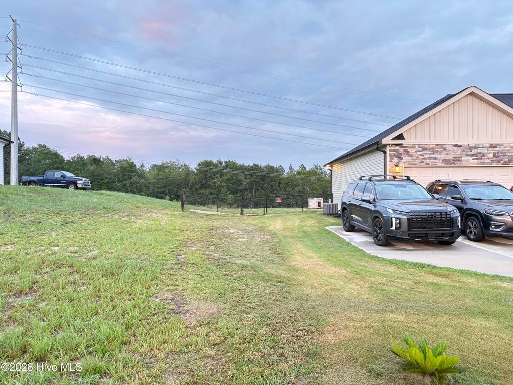 Photo of 885 Inlet Surf Way, Warrenville, SC 29851 (MLS # 100590921)