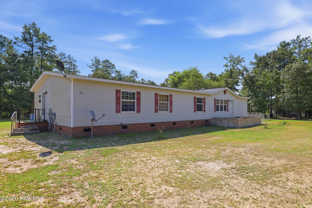 Photo of 371 Maysville Lane, Tar Heel, NC 28392 (MLS # 100593204)