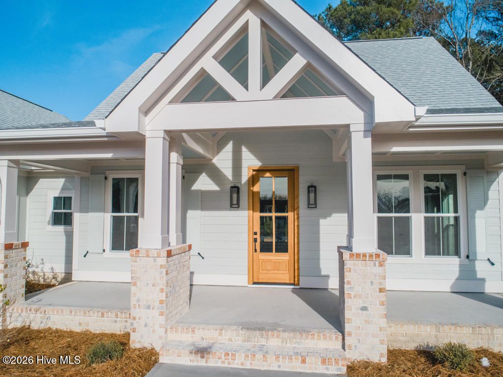 Photo of 128 W Burton Farm Drive, Minnesott Beach, NC 28510 (MLS # 100541540)