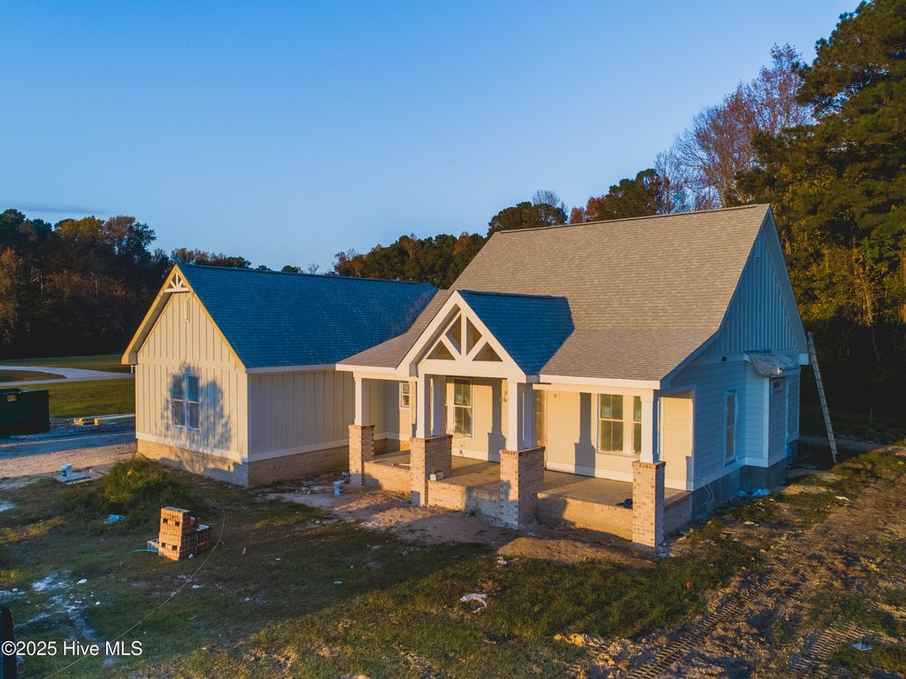 Photo of 128 W Burton Farm Drive, Minnesott Beach, NC 28510 (MLS # 100541540)