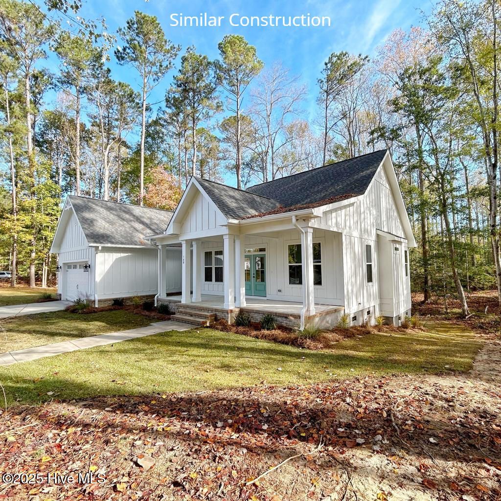 Photo of 128 W Burton Farm Drive, Minnesott Beach, NC 28510 (MLS # 100541540)