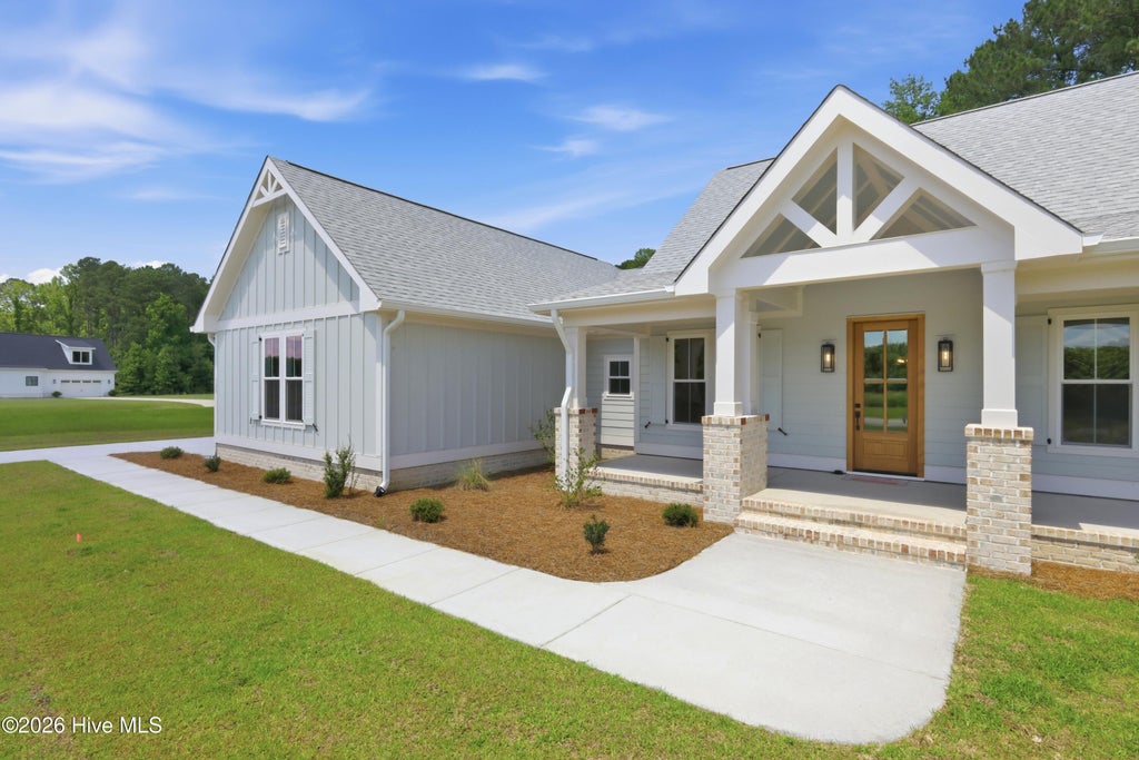 Photo of 128 W Burton Farm Drive, Minnesott Beach, NC 28510 (MLS # 100541540)
