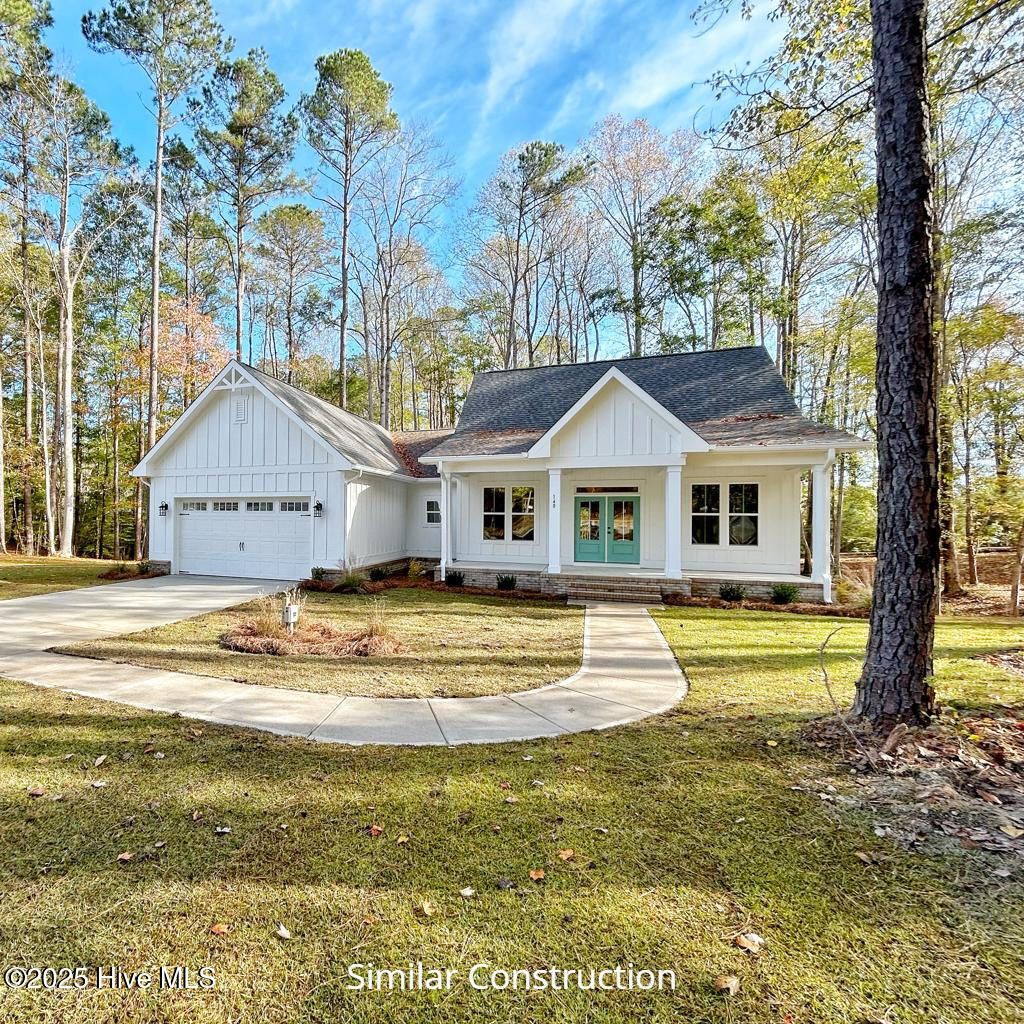 Photo of 128 W Burton Farm Drive, Minnesott Beach, NC 28510 (MLS # 100541540)