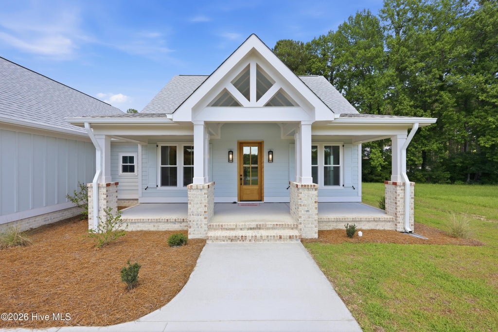 Photo of 128 W Burton Farm Drive, Minnesott Beach, NC 28510 (MLS # 100541540)