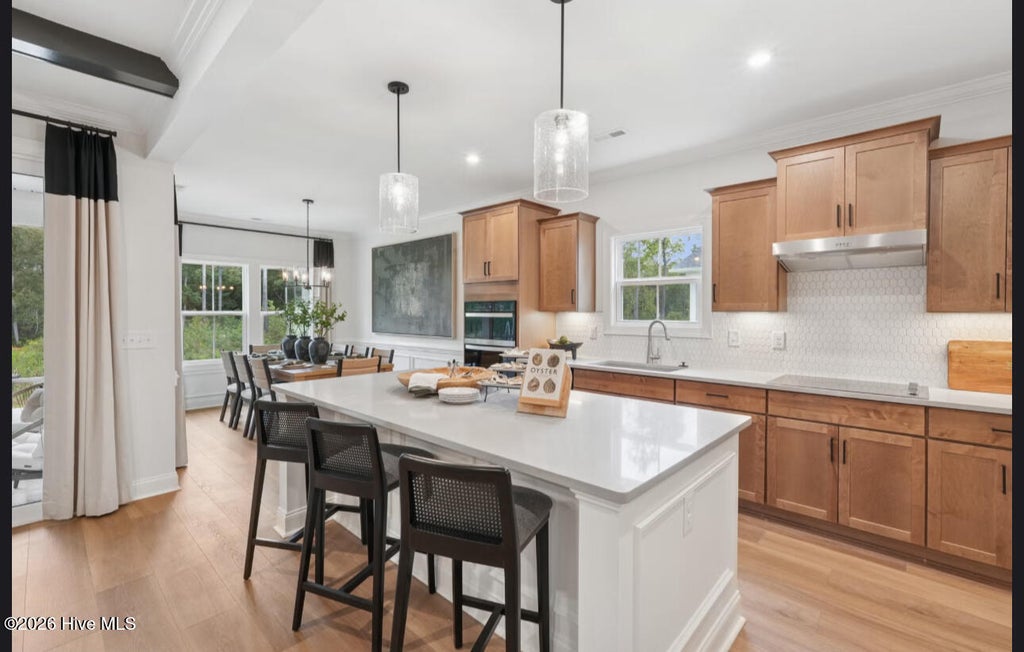 Photo of 7084 Marsh Shore Point #151, Leland, NC 28451 (MLS # 100613324)