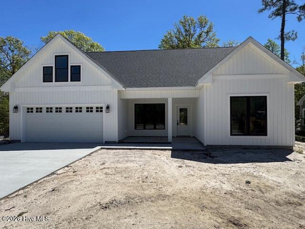 Photo of 554 Sanctuary Point SW, Supply, NC 28462 (MLS # 100566853)