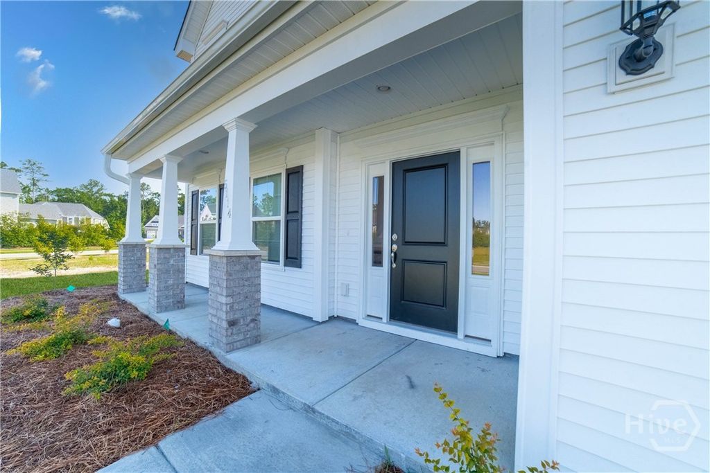 Photo of 5114 Castleoak Drive, Richmond Hill, GA 31324 (MLS # SA354634)