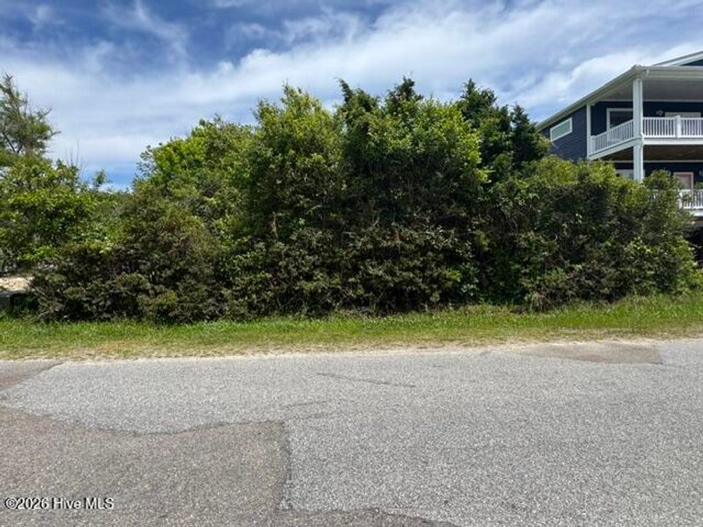 Photo of 116 SE 74th Street, Oak Island, NC 28465 (MLS # 100573678)
