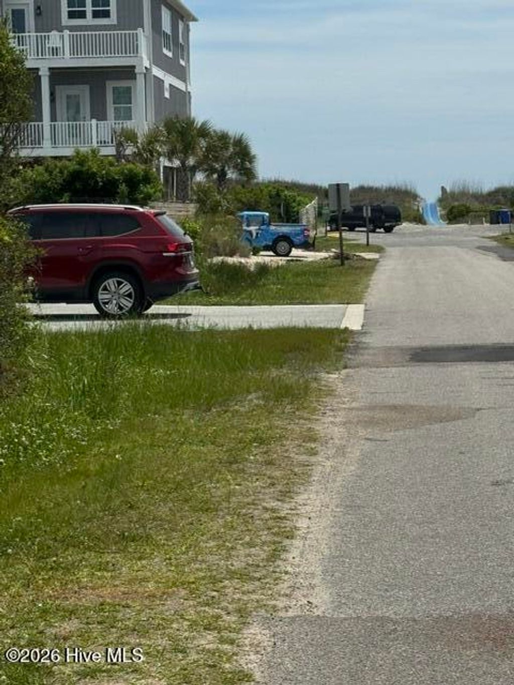 Photo of 116 SE 74th Street, Oak Island, NC 28465 (MLS # 100573678)