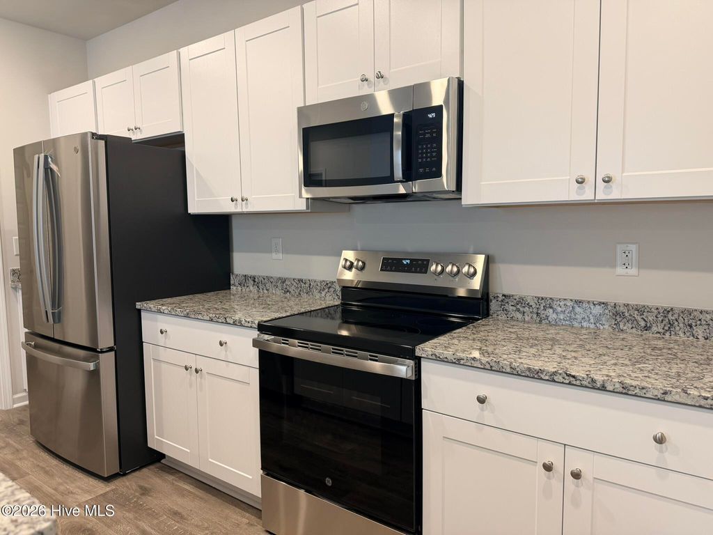 Photo of 413 Ladyfish Loop NW, Sunset Beach, NC 28468 (MLS # 100557384)