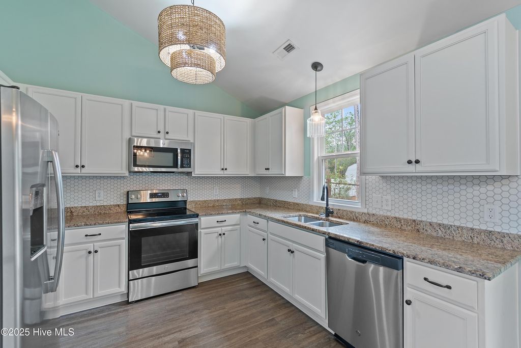 Photo of 880 Eden Drive, Southport, NC 28461 (MLS # 100539694)