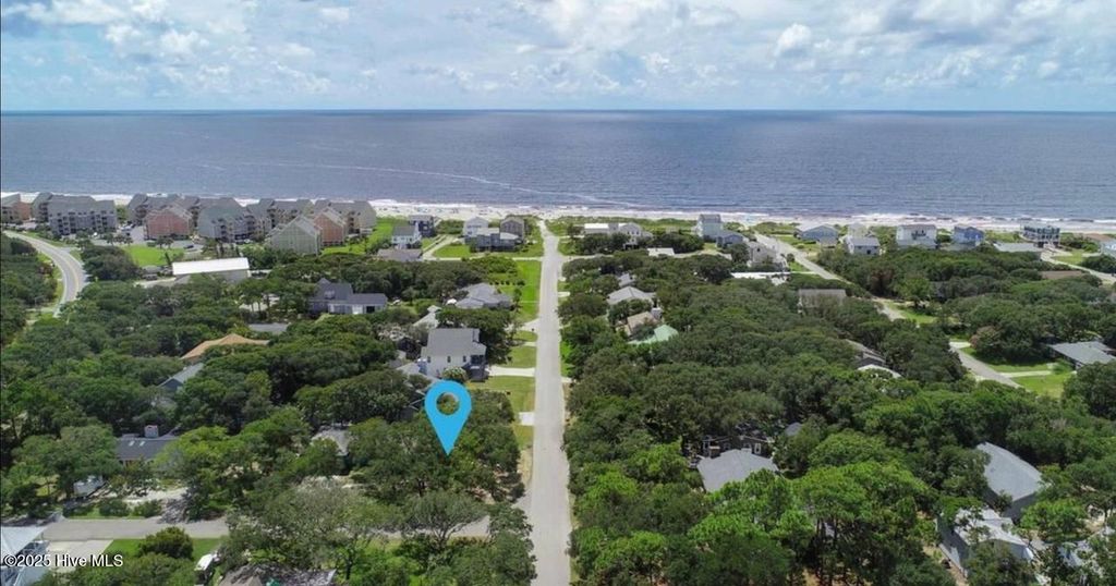 Photo of 103 Throckmorton Street, Oak Island, NC 28465 (MLS # 100522613)