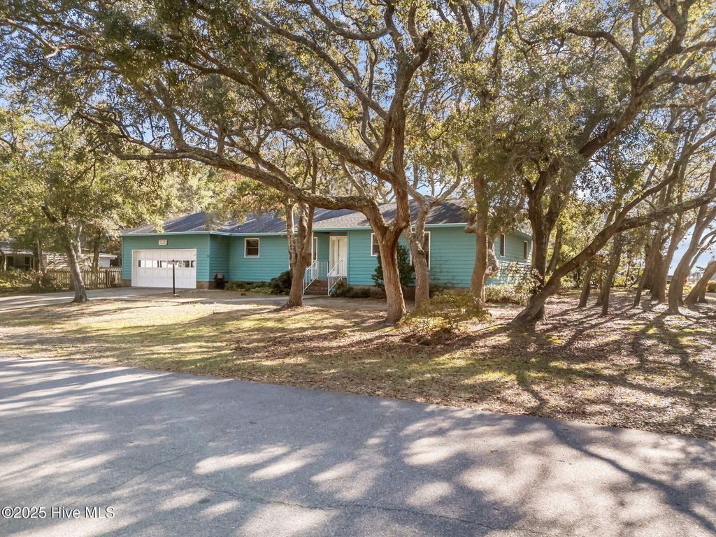 Photo of 103 Throckmorton Street, Oak Island, NC 28465 (MLS # 100522613)