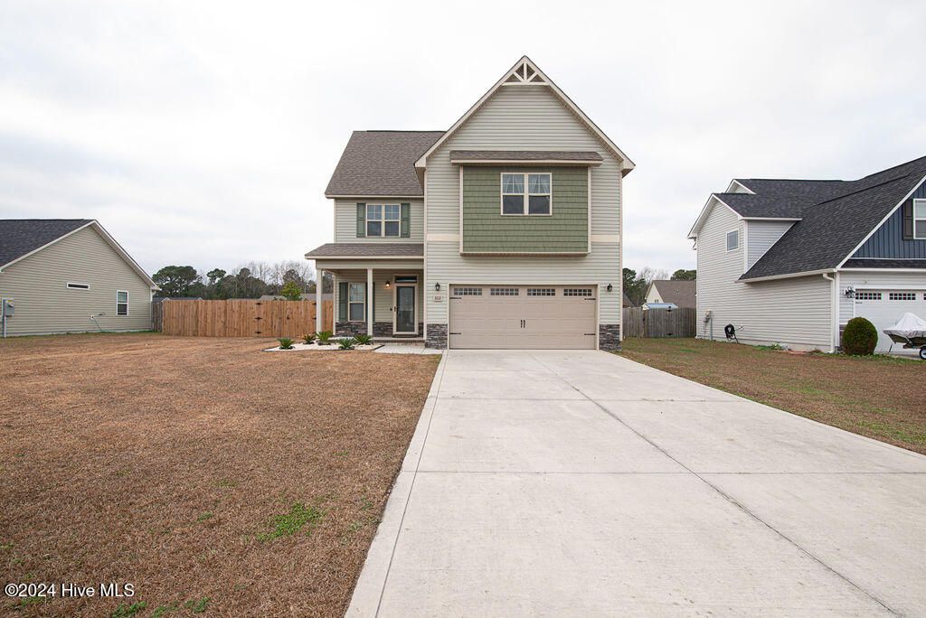Photo of 303 Channel Run Lane, Sneads Ferry, NC 28460 (MLS # 100565777)