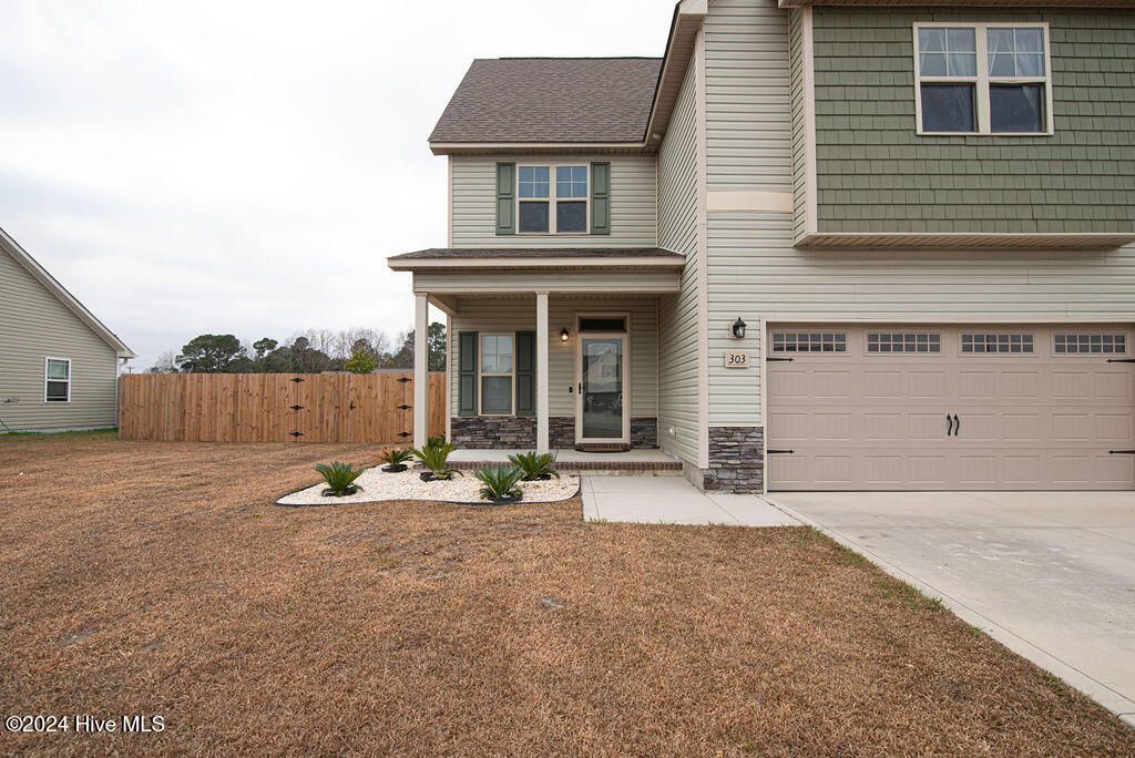 Photo of 303 Channel Run Lane, Sneads Ferry, NC 28460 (MLS # 100565777)