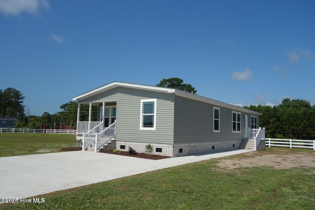 Photo of 880 Yaupon Drive SW, Calabash, NC 28467 (MLS # 100569266)