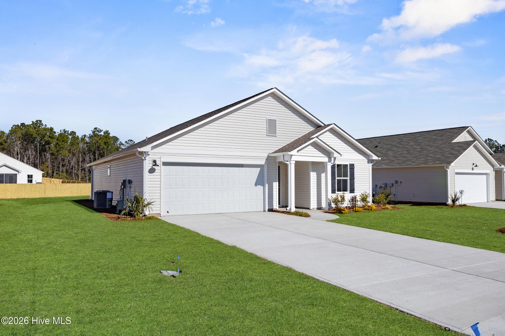 Photo of 861 Parkway Drive #214, Boiling Spring Lakes, NC 28461 (MLS # 100597112)