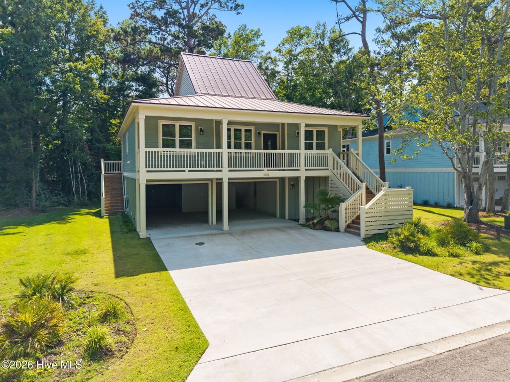 Photo of 1552 Windsong Drive SW, Ocean Isle Beach, NC 28469 (MLS # 100589142)