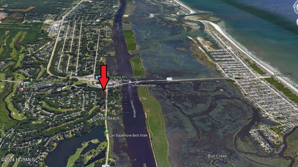 Photo of 200 Shoreline Drive W, Sunset Beach, NC 28468 (MLS # 100447348)