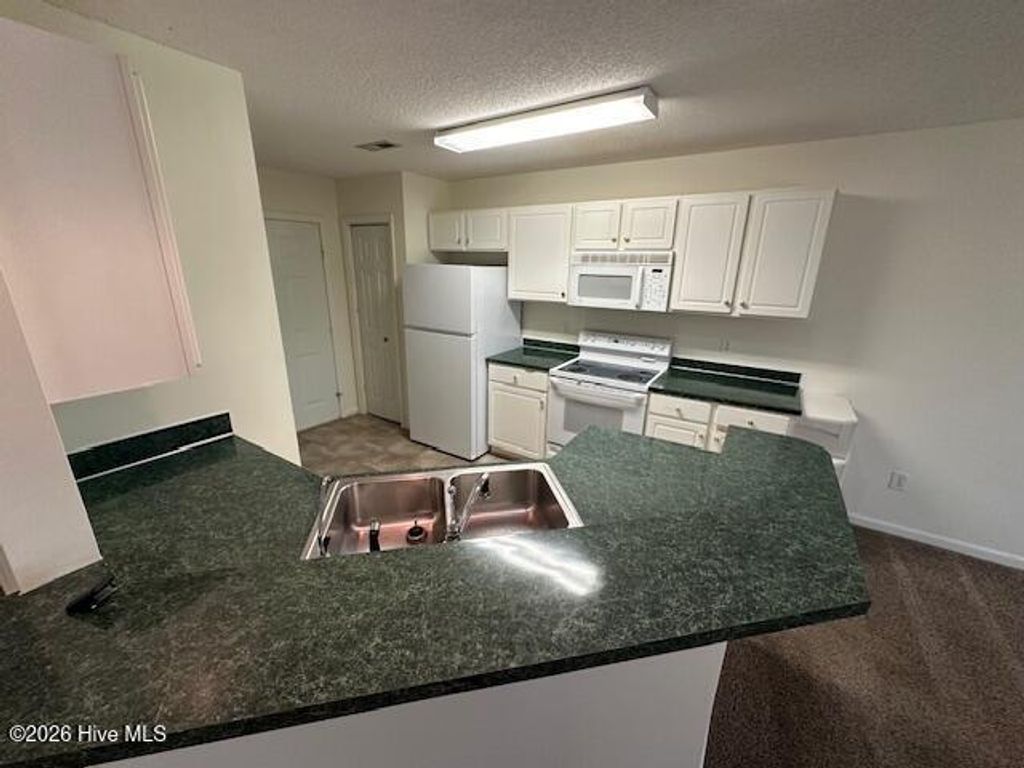 Photo of 1587 Eyota Drive SW, Ocean Isle Beach, NC 28469 (MLS # 100553241)