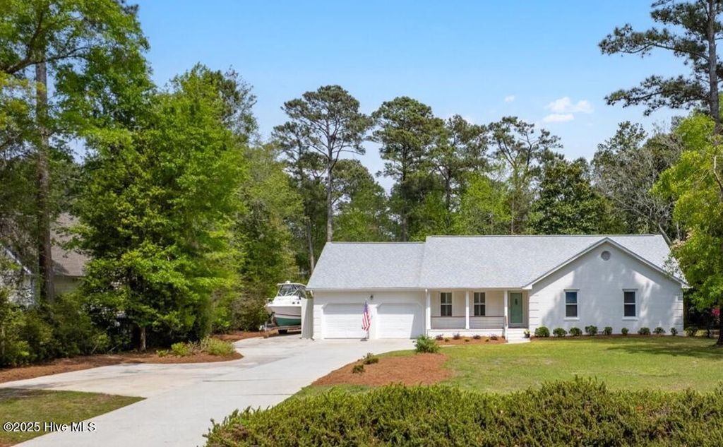 Photo of 709 Saw Grass Road, Hampstead, NC 28443 (MLS # 100500123)