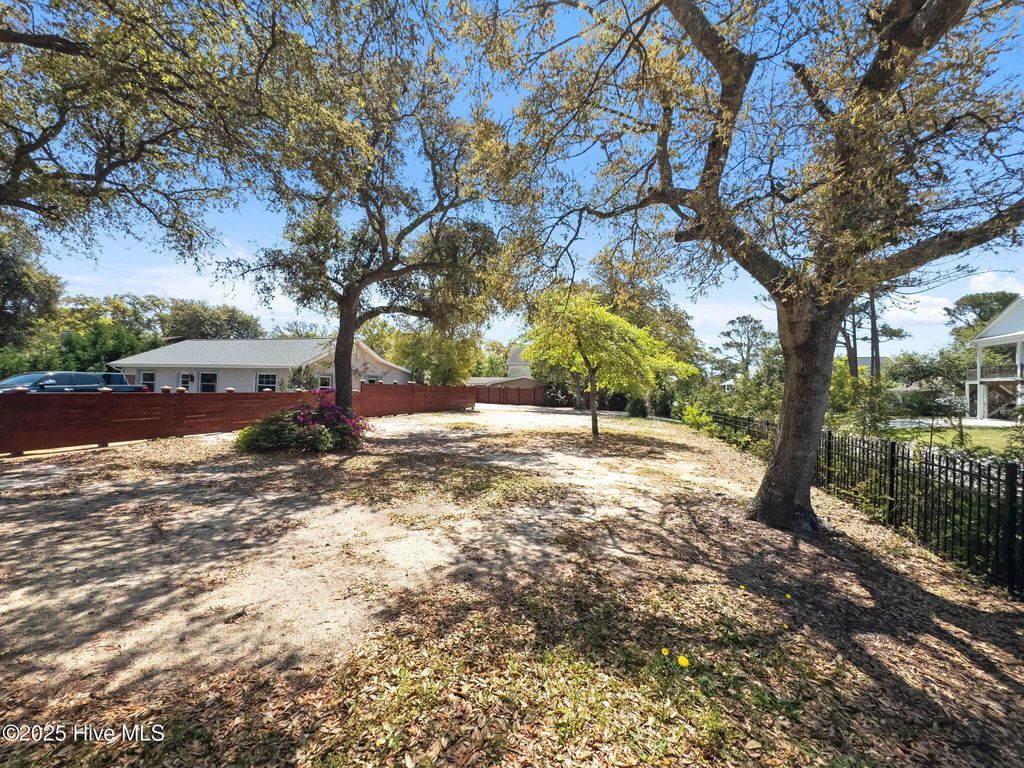 Photo of 4401 E Oak Island Drive, Oak Island, NC 28465 (MLS # 100526137)