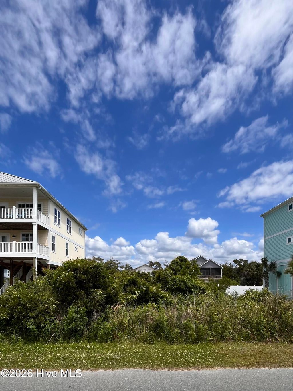 Photo of 4312 E Dolphin Drive, Oak Island, NC 28465 (MLS # 100572047)