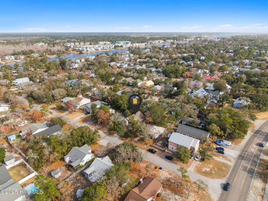 Photo of 104 NE 26th Street, Oak Island, NC 28465 (MLS # 100546852)