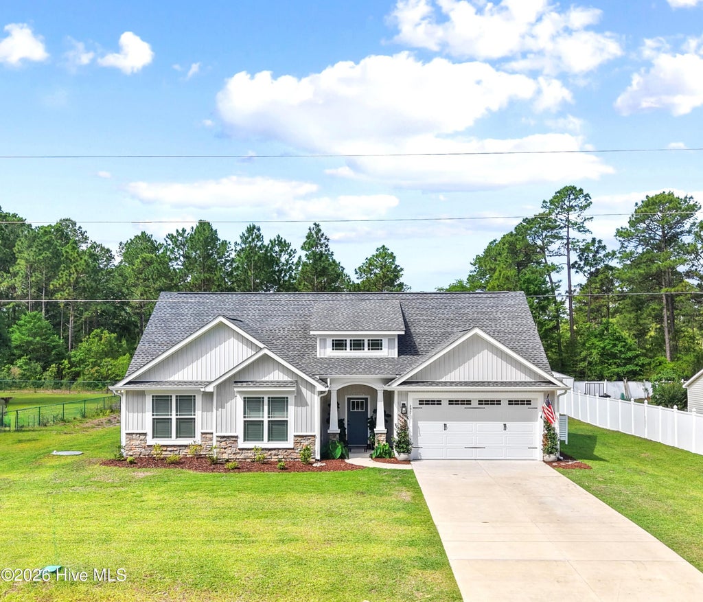 Photo of 299 Boundaryline Drive NW, Calabash, NC 28467 (MLS # 100577465)