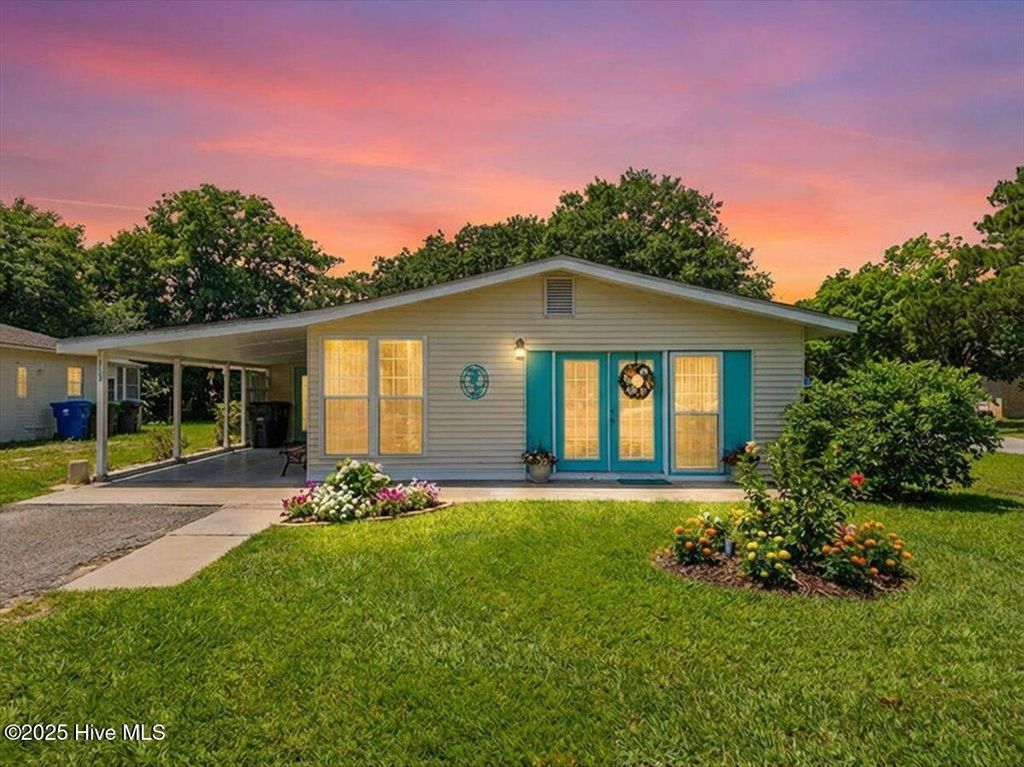 Photo of 115 NE 66th Street, Oak Island, NC 28465 (MLS # 100547366)