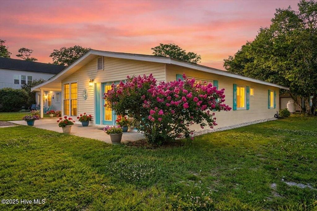 Photo of 115 NE 66th Street, Oak Island, NC 28465 (MLS # 100547366)