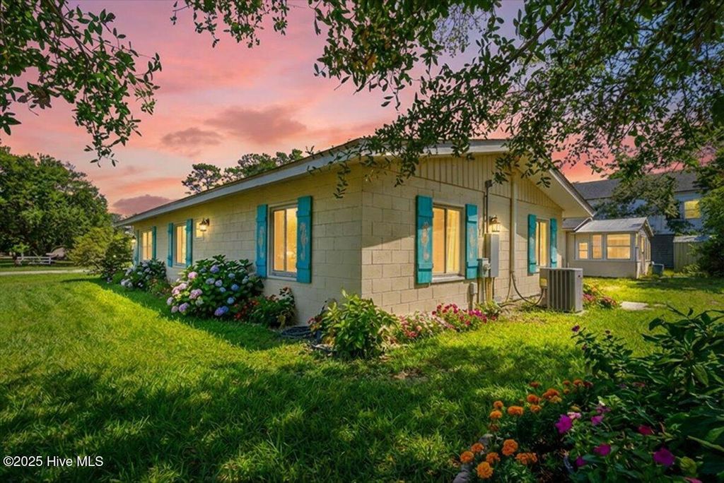 Photo of 115 NE 66th Street, Oak Island, NC 28465 (MLS # 100547366)