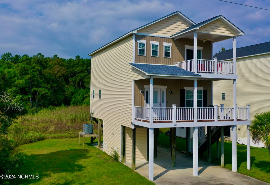 Photo of 250 Riverside Drive, Sneads Ferry, NC 28460 (MLS # 100469557)