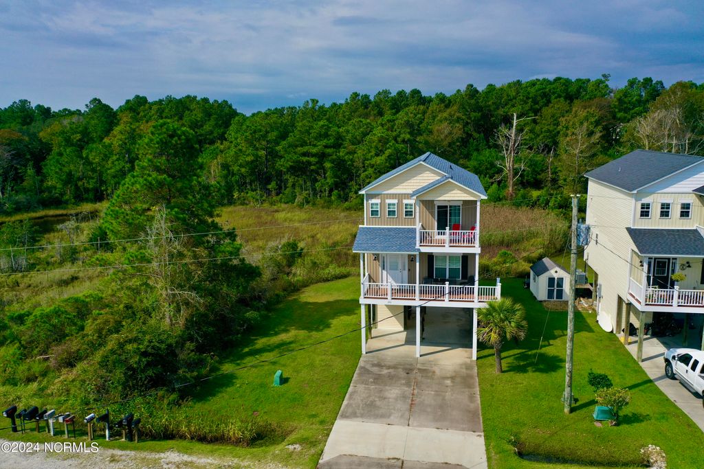 Photo of 250 Riverside Drive, Sneads Ferry, NC 28460 (MLS # 100469557)