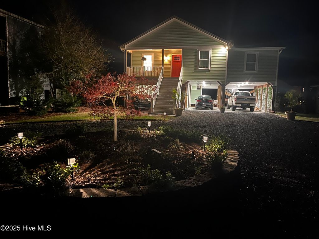 Photo of 107 SW 25th Street, Oak Island, NC 28465 (MLS # 100559807)