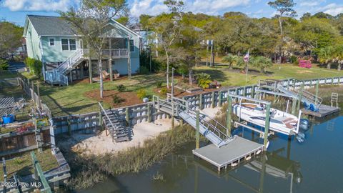 Photo of 107 SW 25th Street, Oak Island, NC 28465 (MLS # 100559807)
