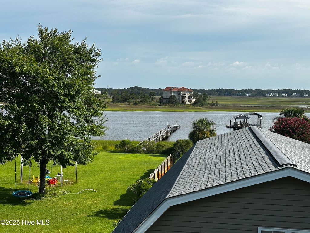 Photo of 5106 E Yacht Drive, Oak Island, NC 28465 (MLS # 100522318)