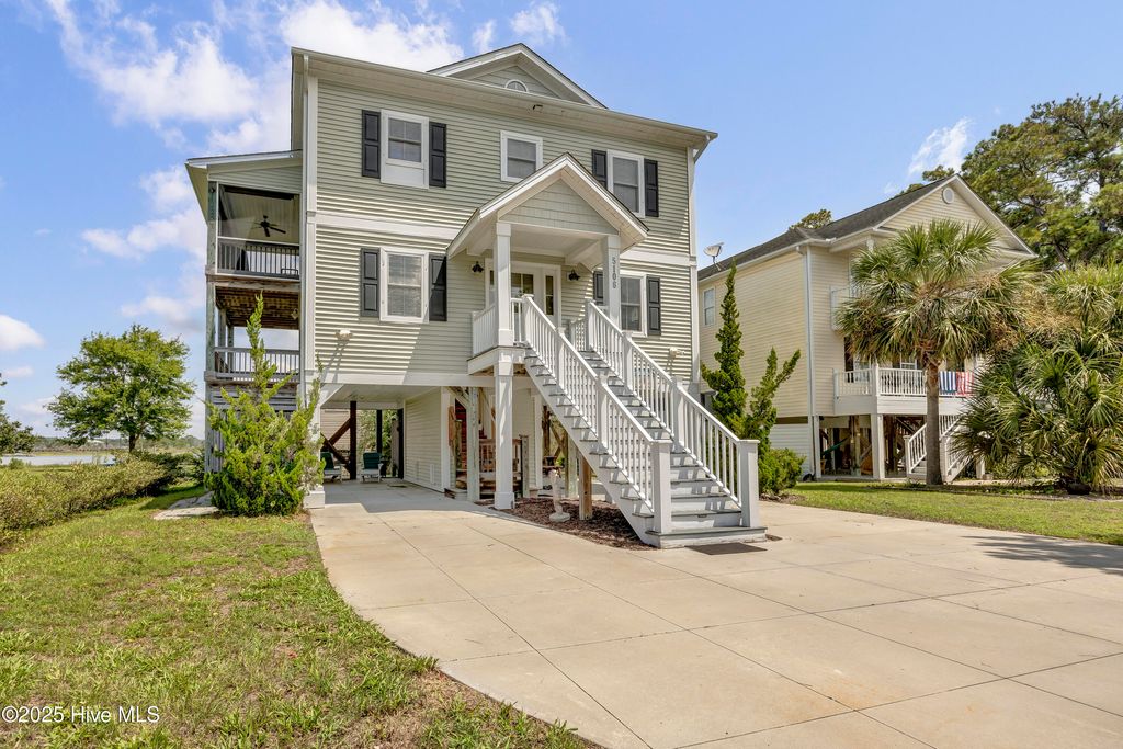 Photo of 5106 E Yacht Drive, Oak Island, NC 28465 (MLS # 100522318)
