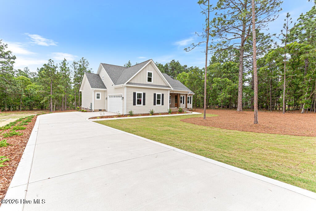 Photo of 131 Longleaf Drive, West End, NC 27376 (MLS # 100601166)