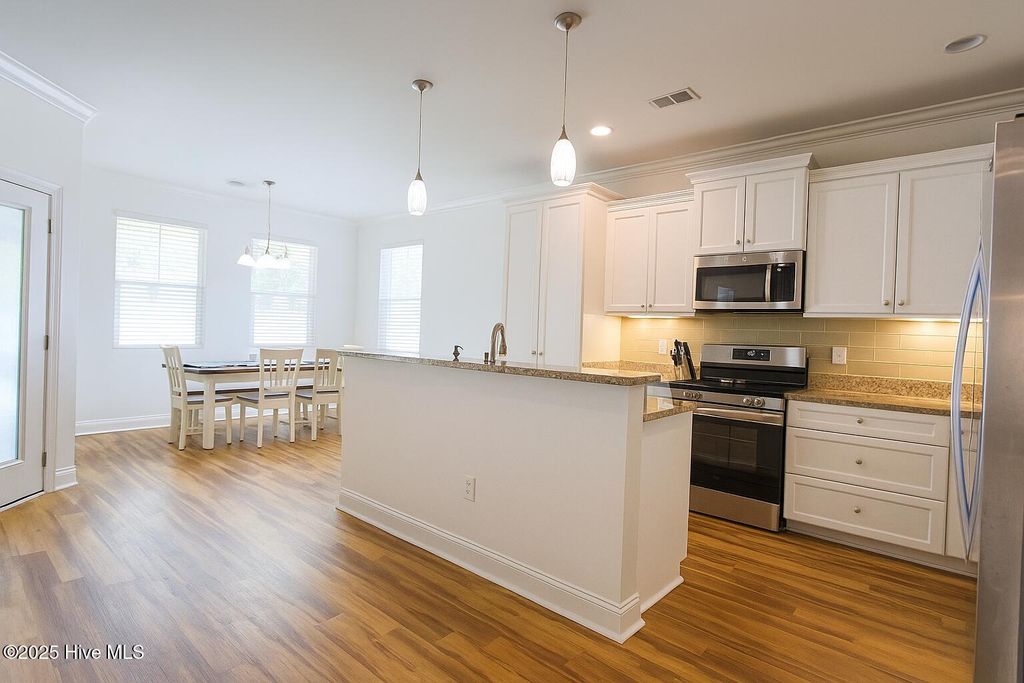 Photo of 1674 Lake Tree Drive SW, Ocean Isle Beach, NC 28469 (MLS # 100539701)