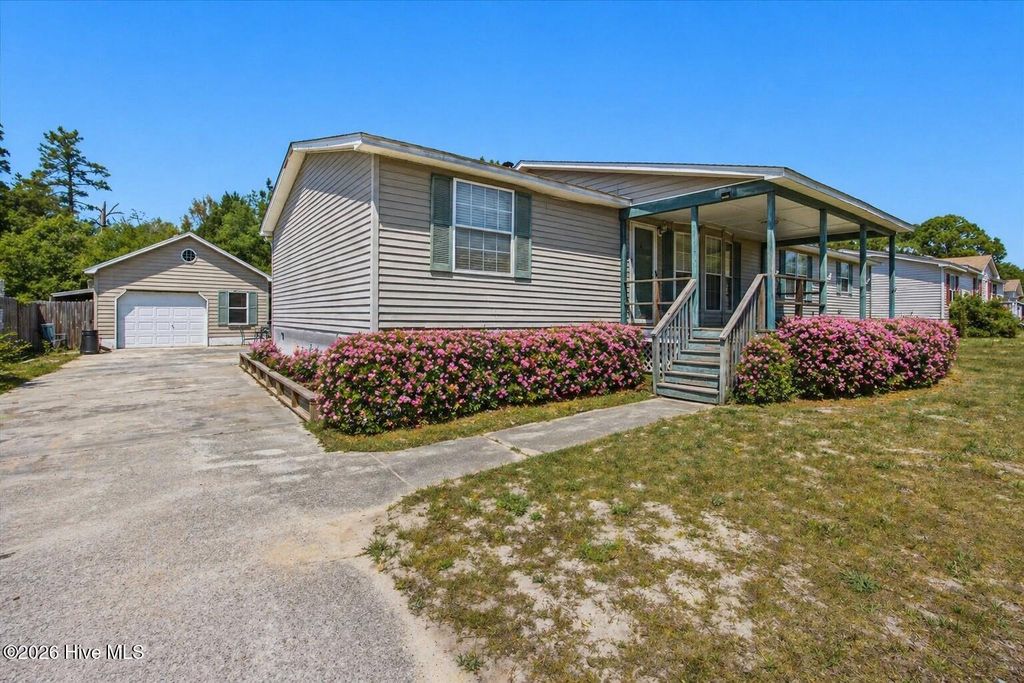 Photo of 6616 Sago Palm Drive, Wilmington, NC 28412 (MLS # 100569613)