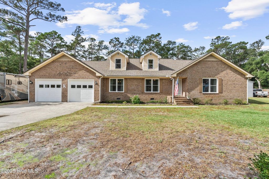 Photo of 6 Deerwood Circle, Oak Island, NC 28465 (MLS # 100539788)